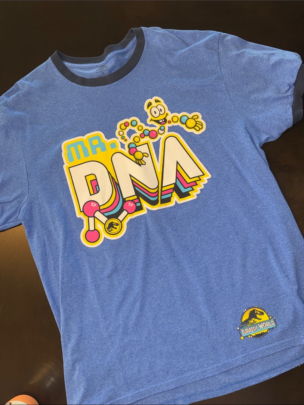 Jurassic World Adult Men’s Blue "Mr. DNA" Graphic Ringer Tee